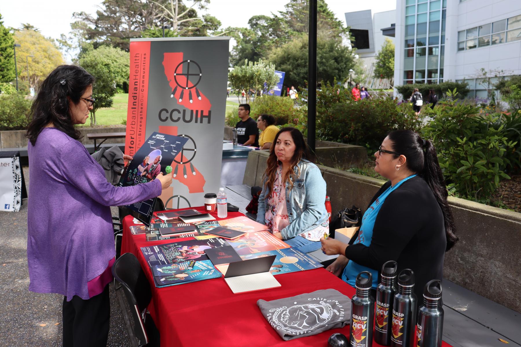 Catriona Esquibel, April McGill, and Jackie Pierson at Community Organizing Fair, September 10, 2019