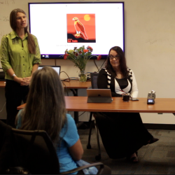 Guest speakers providing a talk to a group of individuals
